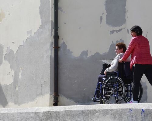 woman-sitting-on-gray-wheelchair